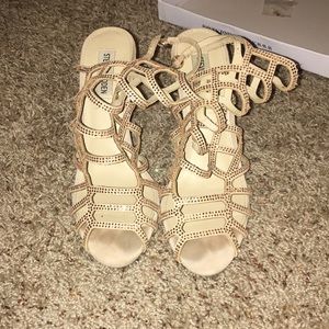 Gold Steve Madden caged heels